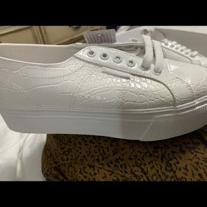Brand new never worn white platform Superga sneakers with crocodile print.
